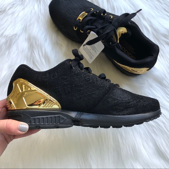 adidas torsion gold and black